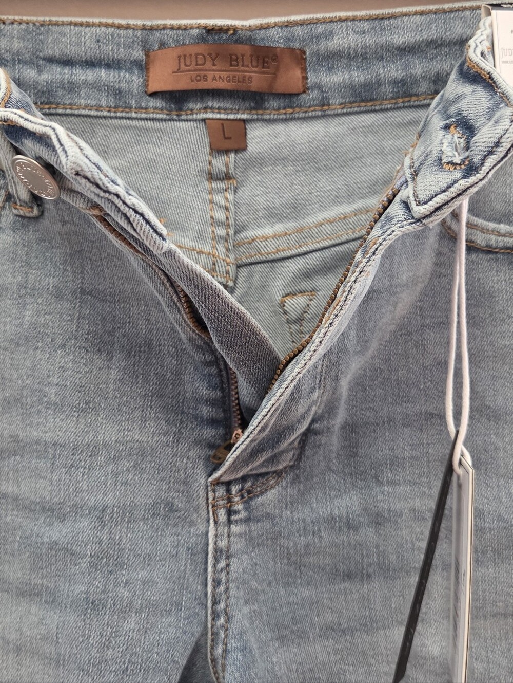 Women's Judy Blue Mid Rise Light Blue Denim Frayed Hem Shorts - Picture 3 of 9